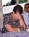 Margaret with head in hands